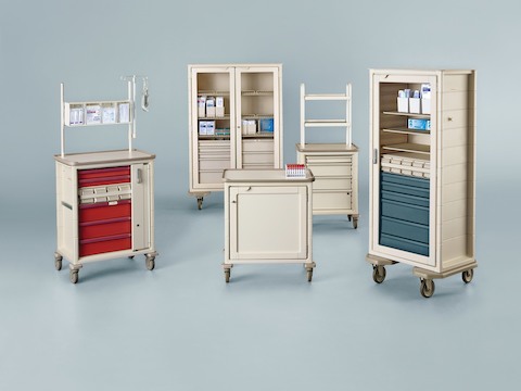 A selection of five mobile storage carts for organizing and transporting healthcare supplies. 